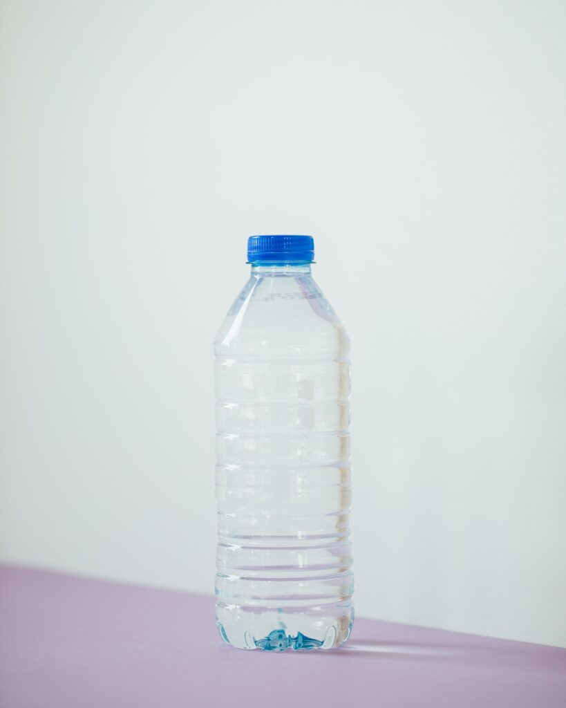 What can plastic be recycled into? A picture of a plastic water bottle.